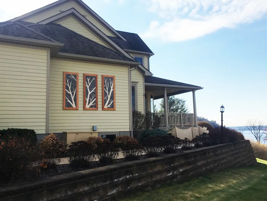 hanging art on house